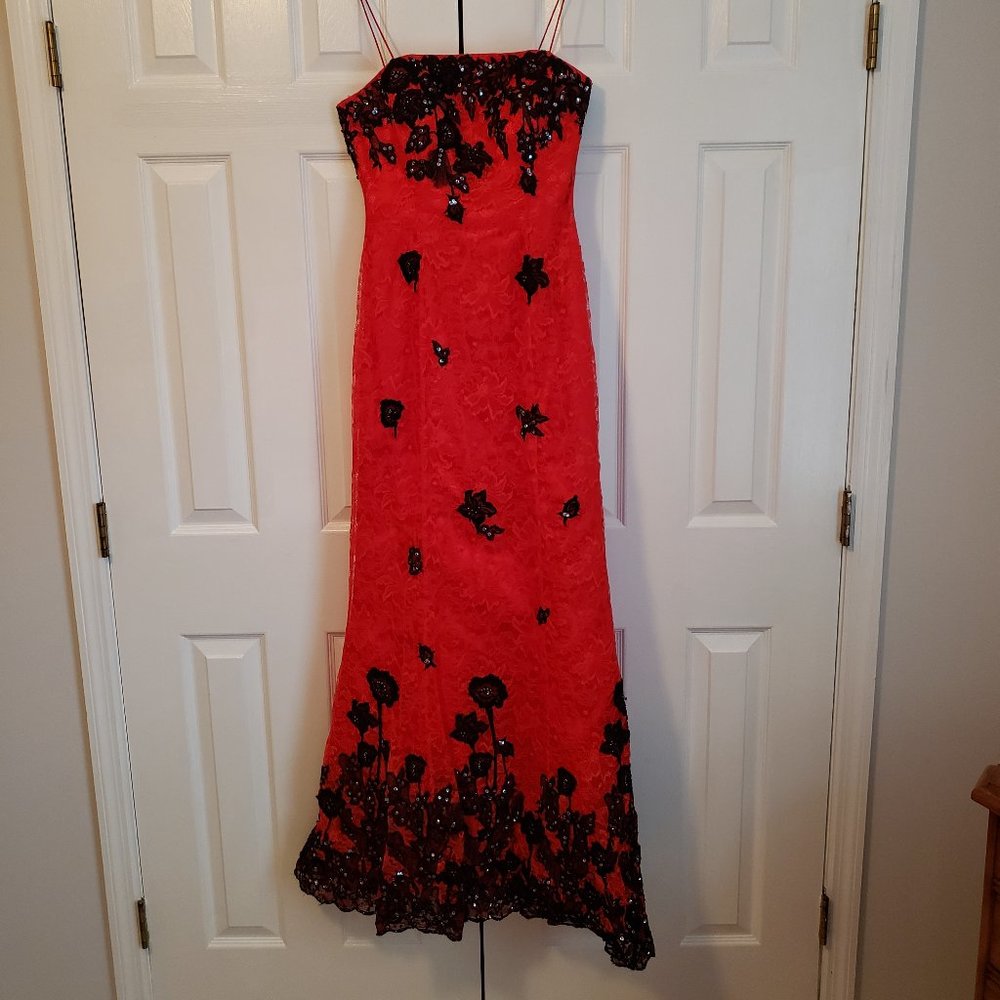 Red lace formal gown with black beading